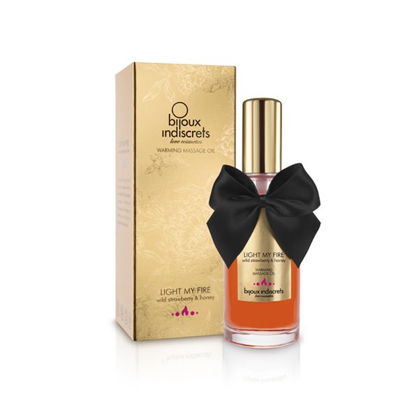 Huile de massage embrassable chauffante fraise - Bijoux Indiscrets